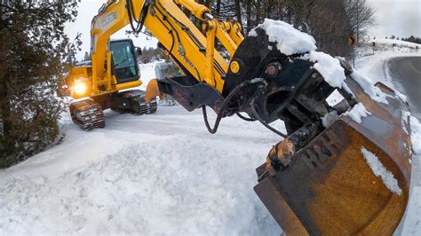 snow plowing with mini excavator|mini x snow removal.